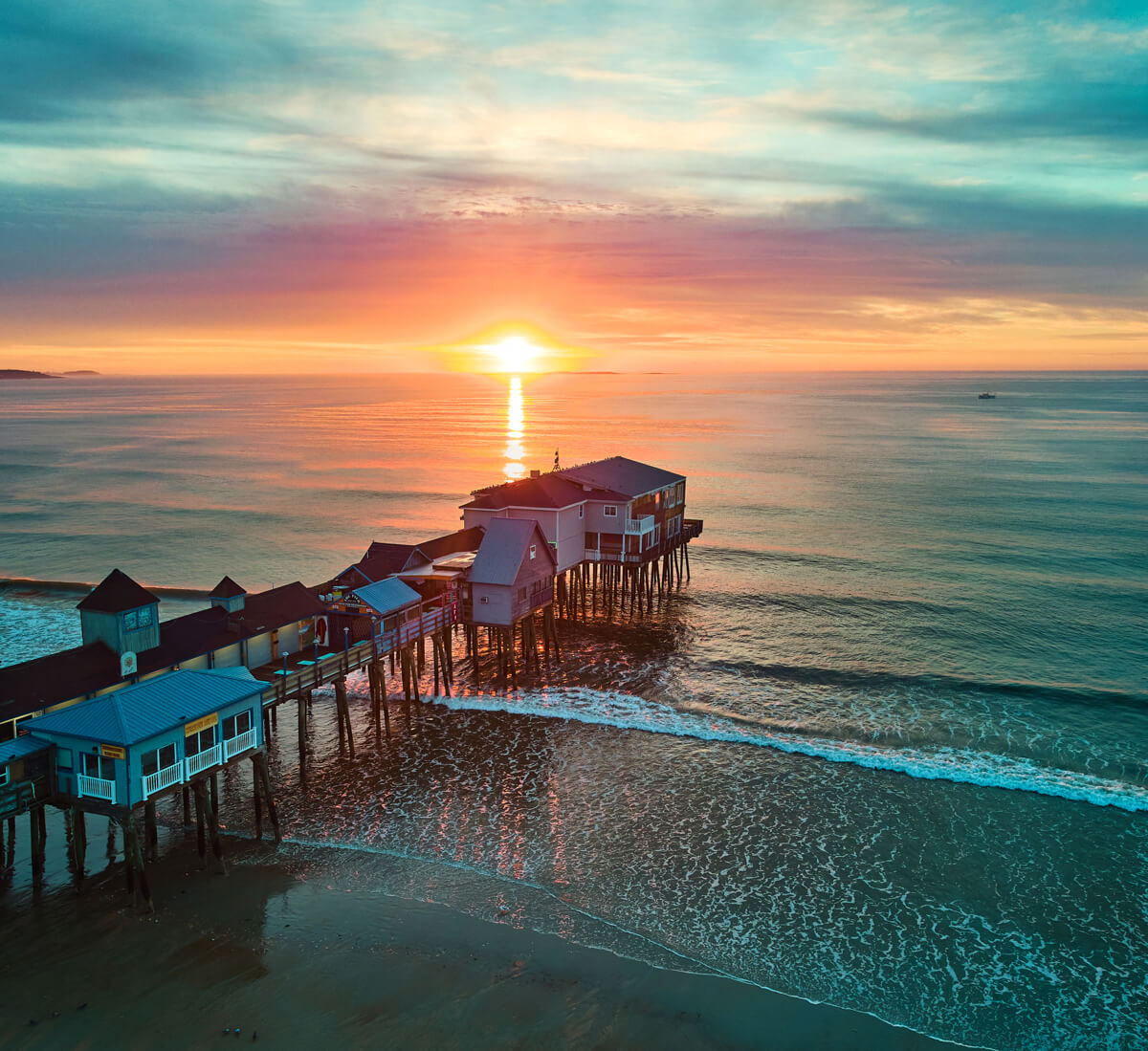 Old Orchard Pier at sunrise facing ocean